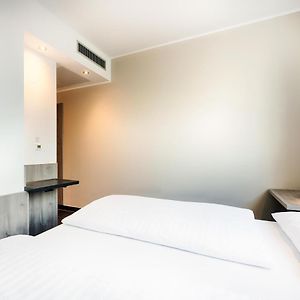 Kamer met een Queen Size Bed